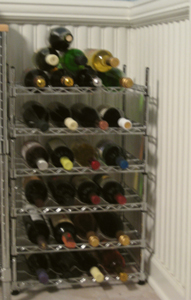 Slightly overloaded wine rack.  Not as badly as it was a couple weeks ago.